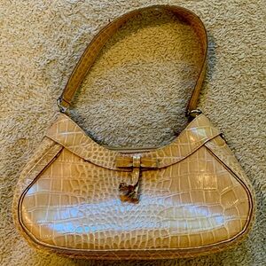 Liz Claiborne bag. Tan snakeskin exterior covering.